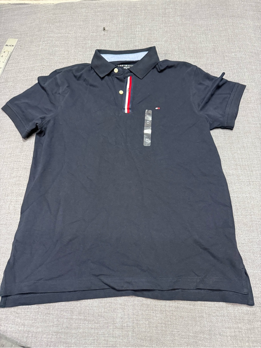 Tommy Hilfiger Men’s black Polo Shirt with Signature Trim
